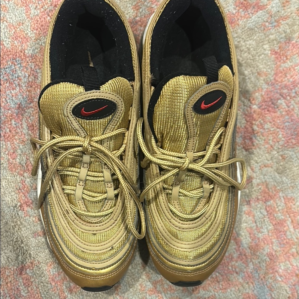Nike Gold Sneakers with Red Swoosh